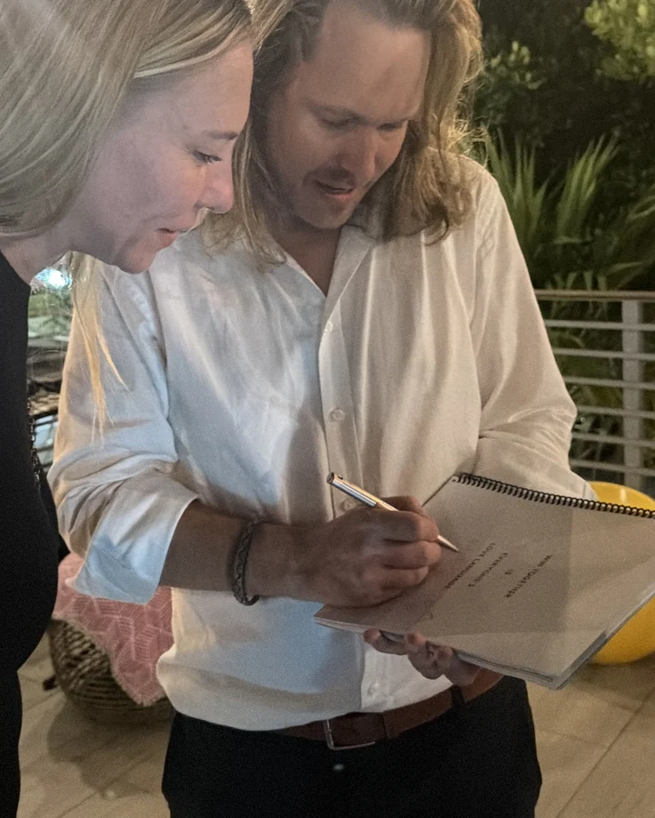 Jeff signing a copy of Win Together