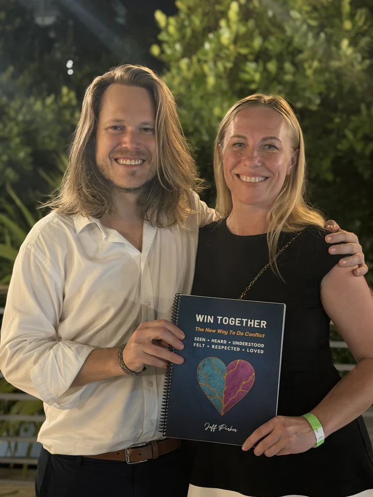 Jeff Parker Love with Natalia, a colleague and reader, holding Win Together