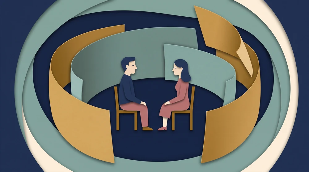A couple seated inside a protective circle