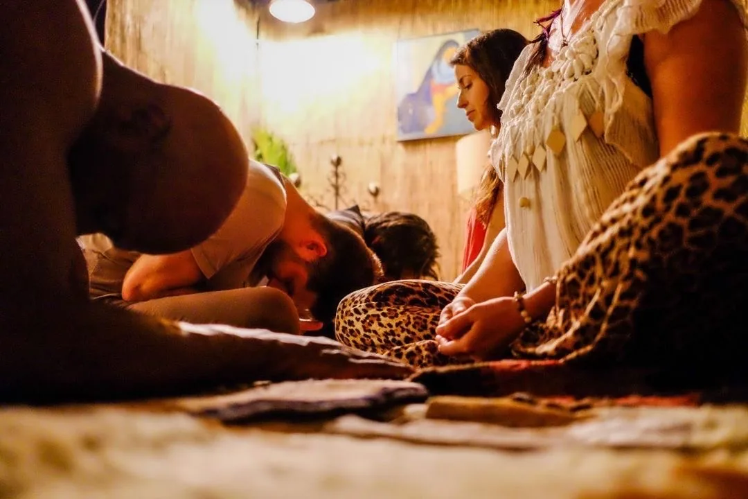 Two people bowing to each other